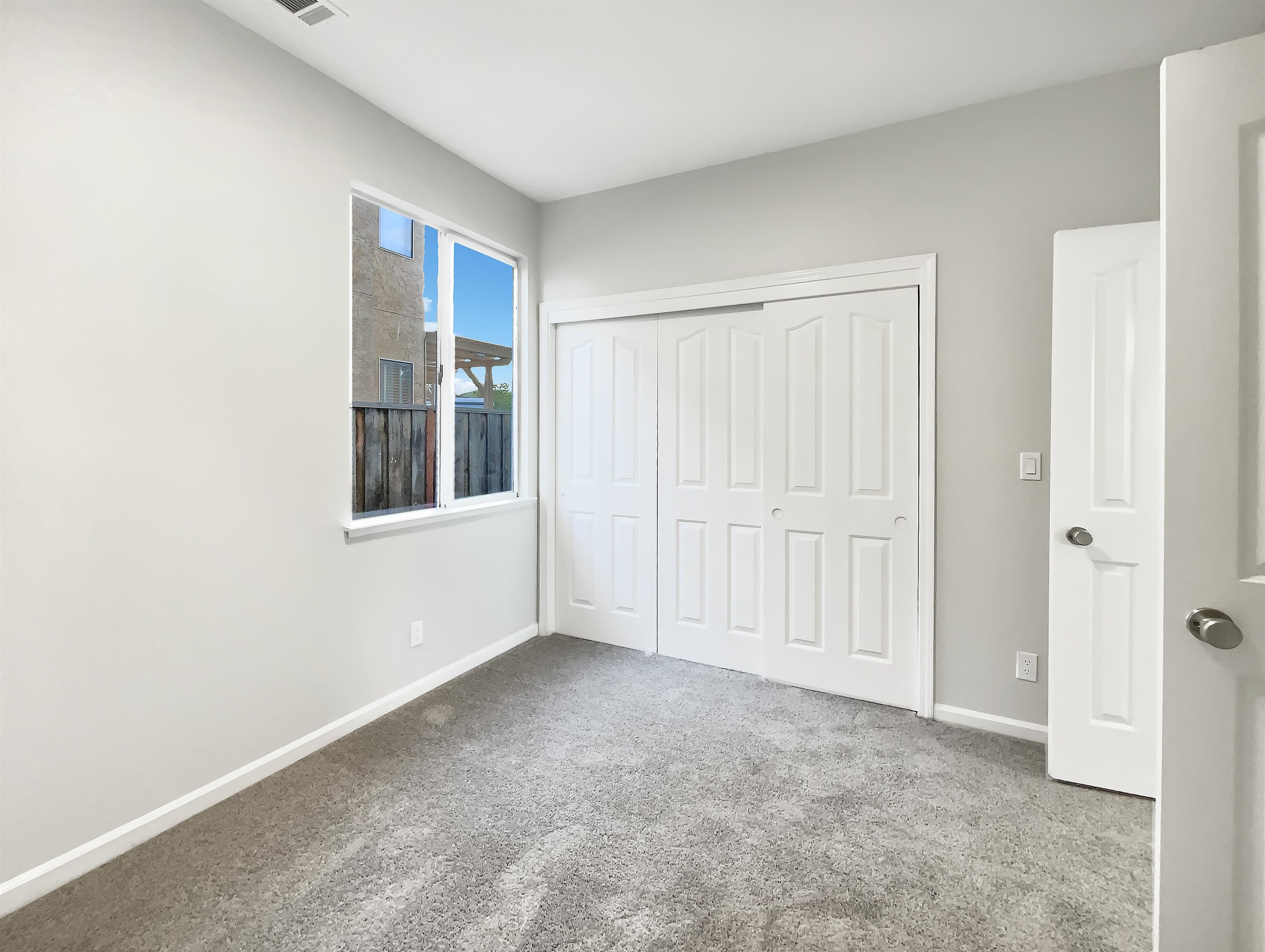 1474 Rutherford Lane Oakley, CA 94561 - Photo 16 of 31 Unfurnished bedroom featuring carpet and a closet