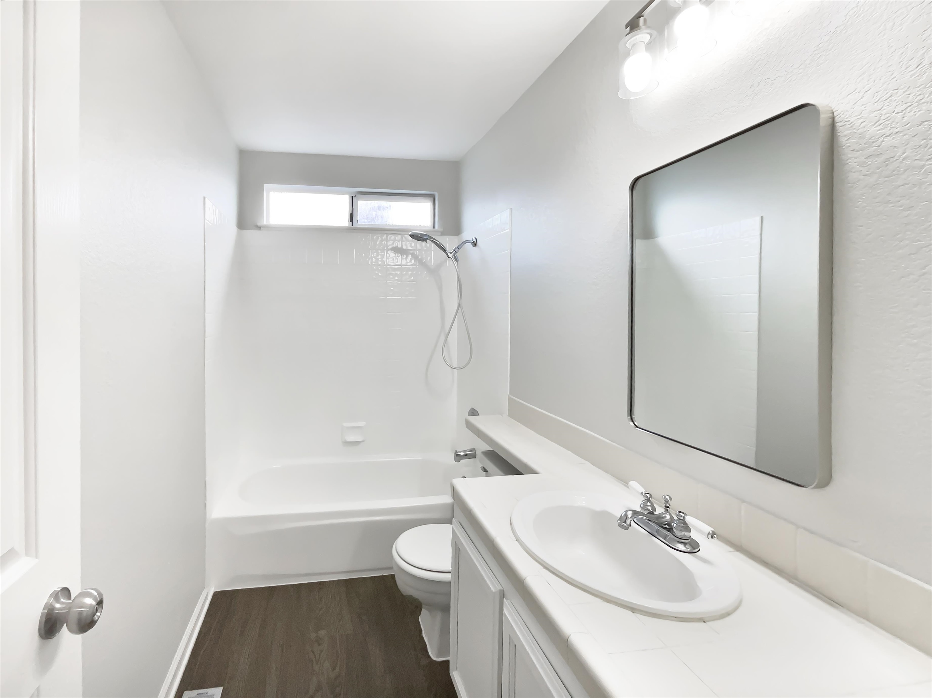 1474 Rutherford Lane Oakley, CA 94561 - Photo 21 of 31 Bathroom featuring vanity, washtub / shower combination, and dark wood-type flooring