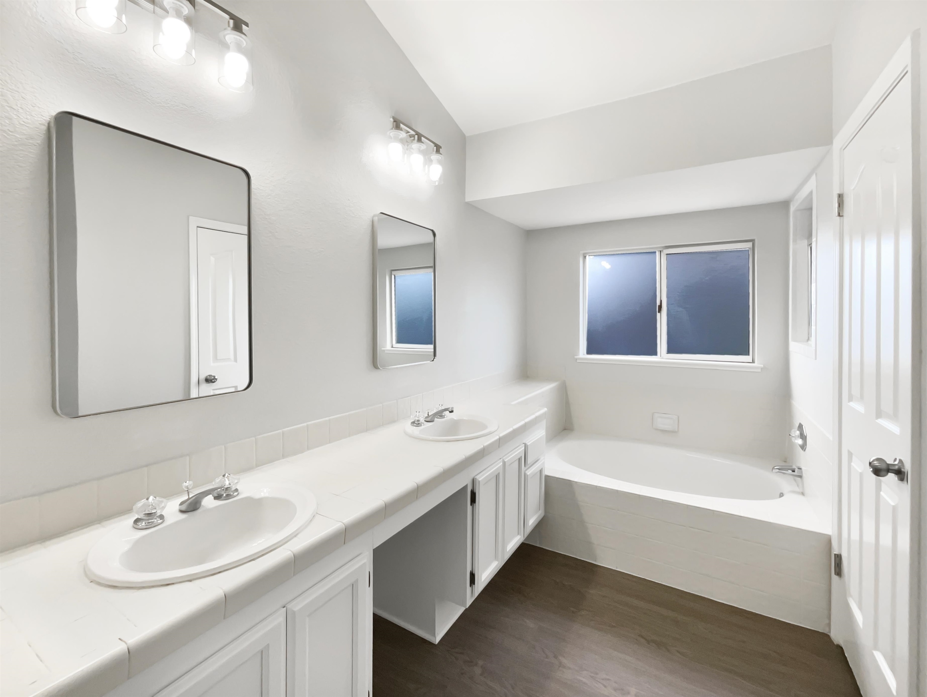 1474 Rutherford Lane Oakley, CA 94561 - Photo 7 of 31 Full bathroom featuring a bath, double vanity, and dark wood finished floors