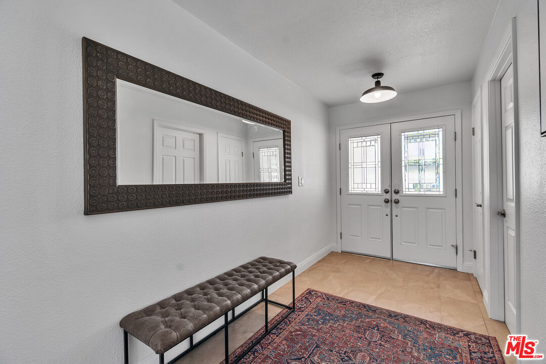 109 Torremolinos Drive Rancho Mirage, CA 92270 - Photo 17 of 39 a bedroom with a bed and a dresser