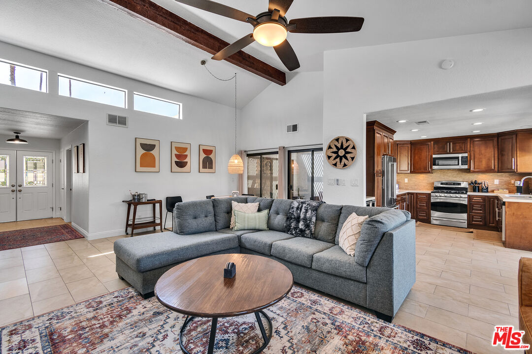 109 Torremolinos Drive Rancho Mirage, CA 92270 - Photo 21 of 39 a living room with furniture and a large window