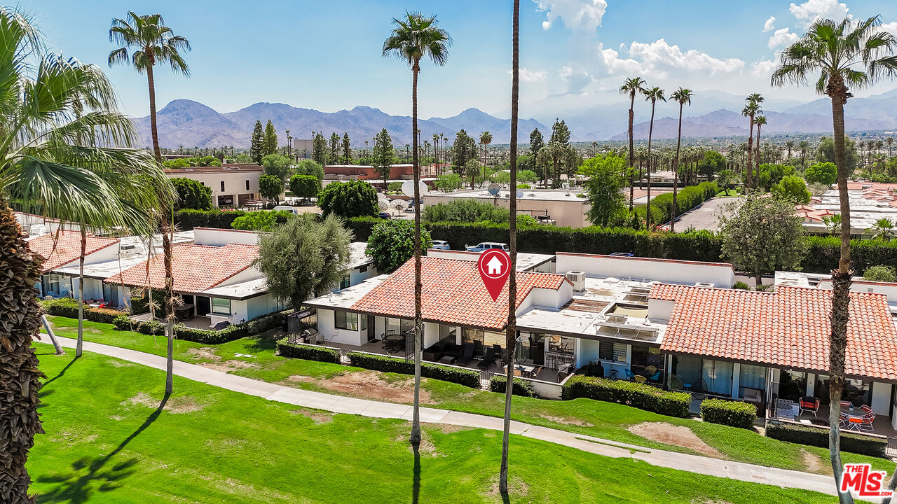 109 Torremolinos Drive Rancho Mirage, CA 92270 - Photo 33 of 39 a view of a houses with cars park