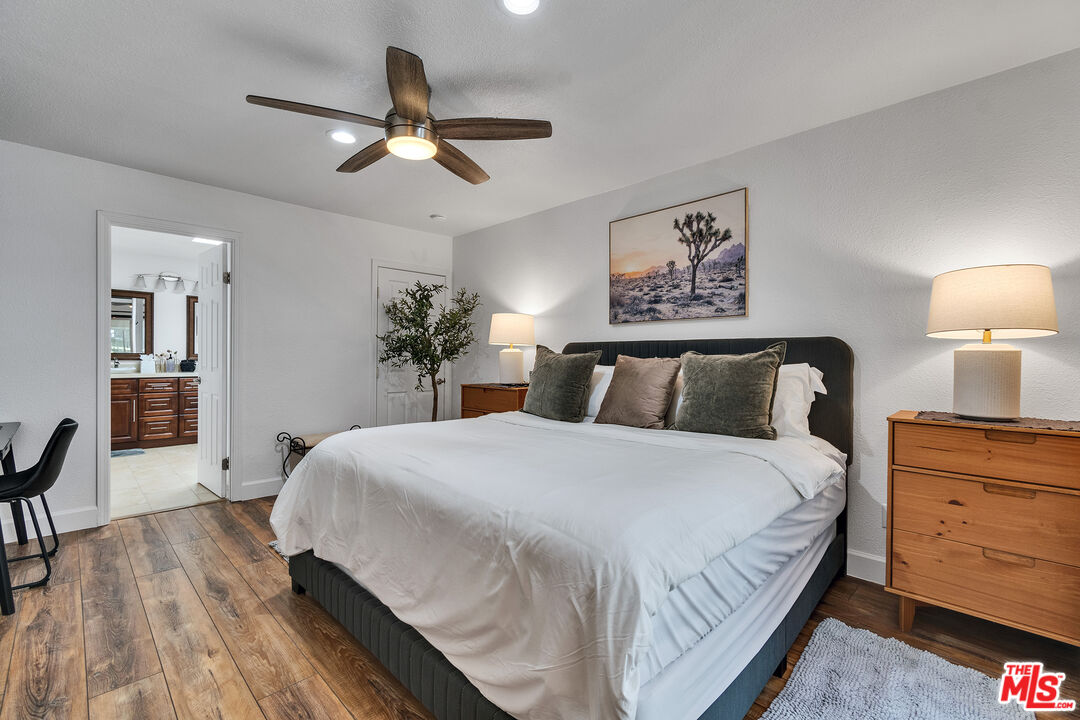 109 Torremolinos Drive Rancho Mirage, CA 92270 - Photo 8 of 39 a spacious bedroom with a bed and dresser