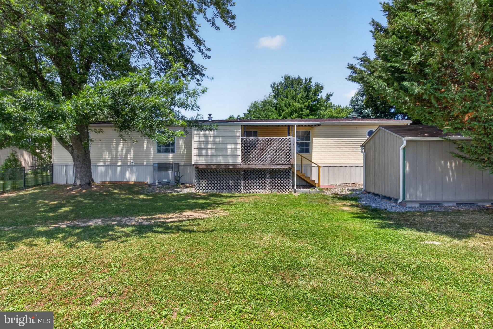 1910 Schubert Road, Unit 8 Bethel, PA 19507 - Photo 31 of 40 Level lawn invites summer fun