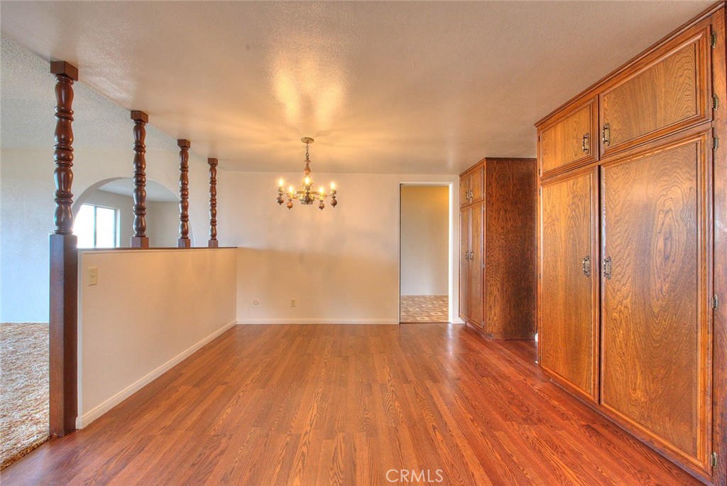 16464 Rancho Escondido Drive Riverside, CA 92506 - Photo 12 of 47 a view of a room with wooden floor