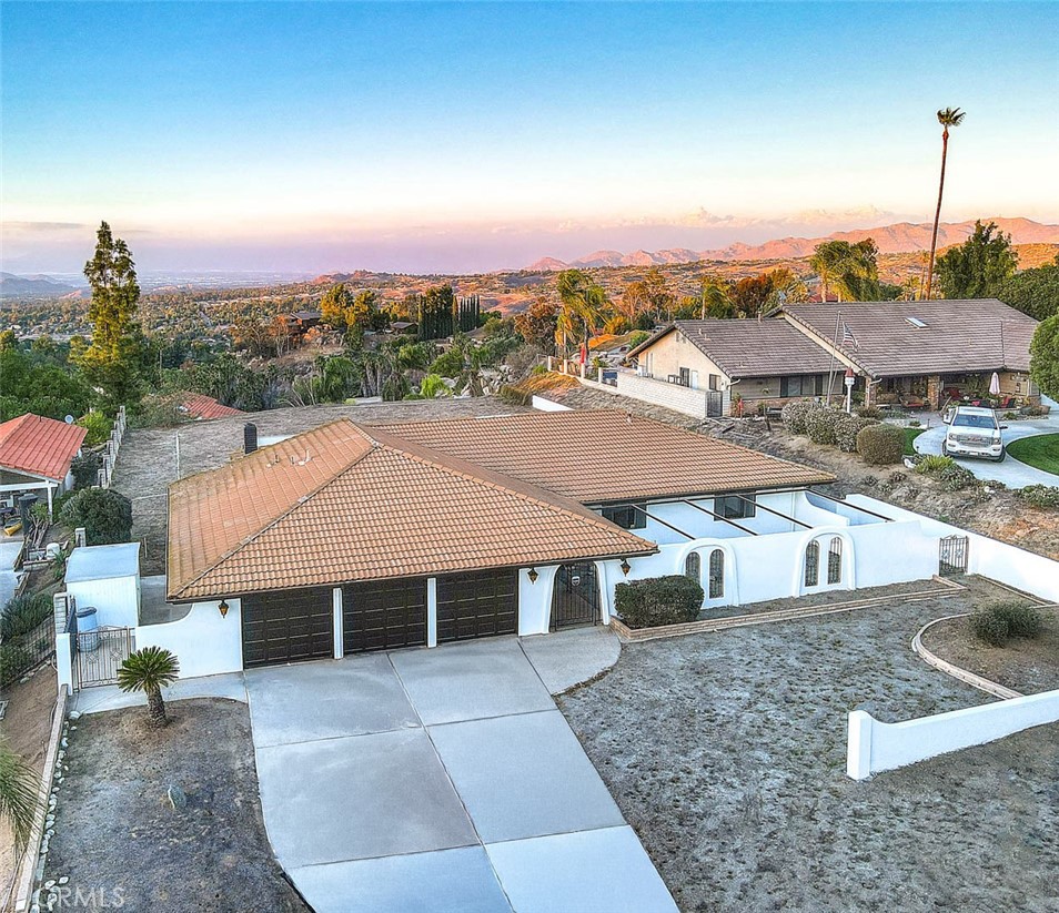 16464 Rancho Escondido Drive Riverside, CA 92506 - Photo 2 of 47 an aerial view of a house