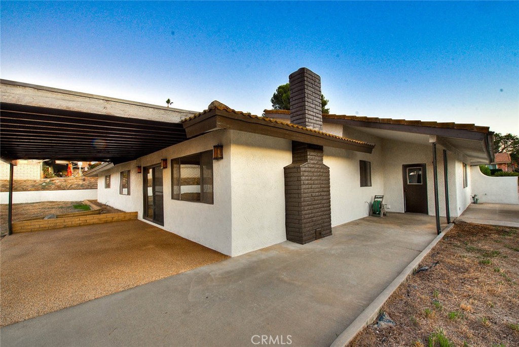 16464 Rancho Escondido Drive Riverside, CA 92506 - Photo 25 of 47 a view of a house with a garage