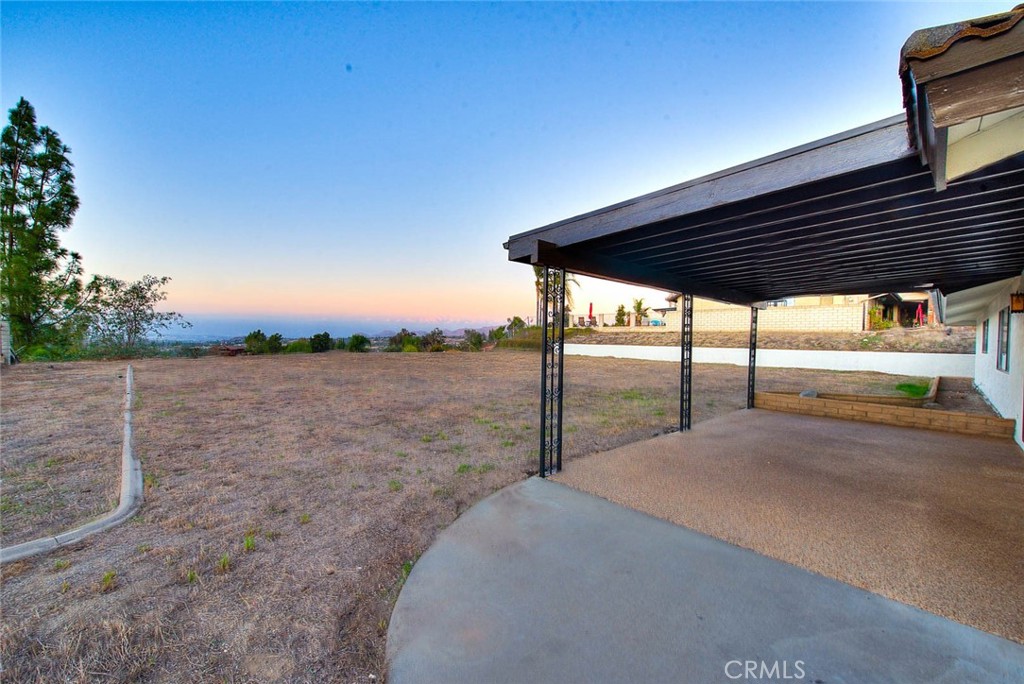 16464 Rancho Escondido Drive Riverside, CA 92506 - Photo 26 of 47 a view of a backyard of the house