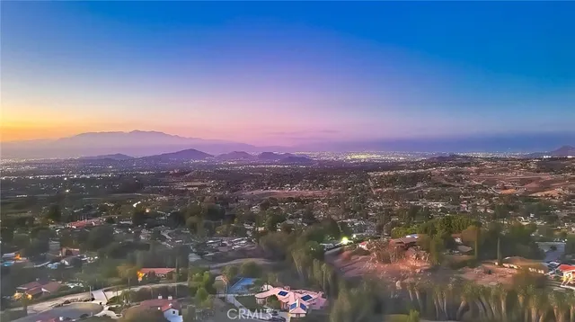 a view of a balcony with an outdoor seating