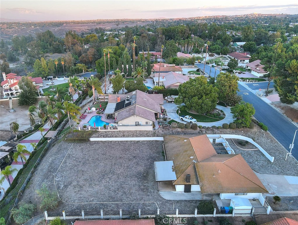 16464 Rancho Escondido Drive Riverside, CA 92506 - Photo 44 of 47 an aerial view of a house with a garden
