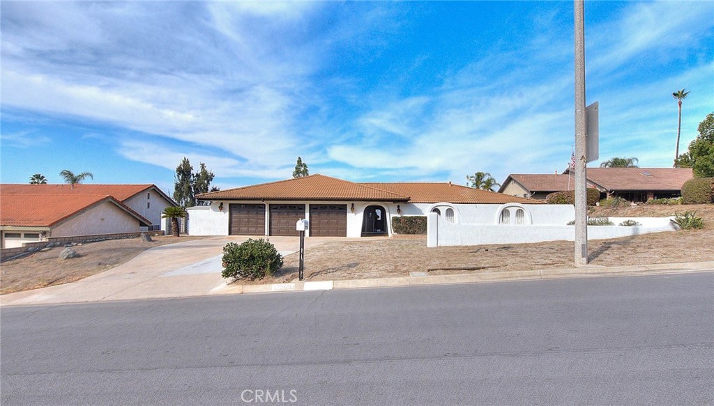 16464 Rancho Escondido Drive Riverside, CA 92506 - Photo 47 of 47 a front view of a house with a yard