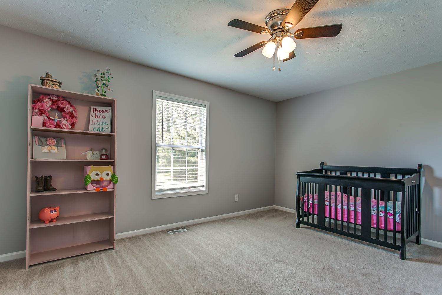 410 Jackson Road Portland, TN 37148 - Photo 11 of 22 a view of livingroom with furniture ceiling fan and window