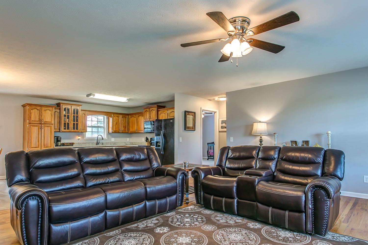 410 Jackson Road Portland, TN 37148 - Photo 6 of 22 a media room with furniture a chandelier and a window