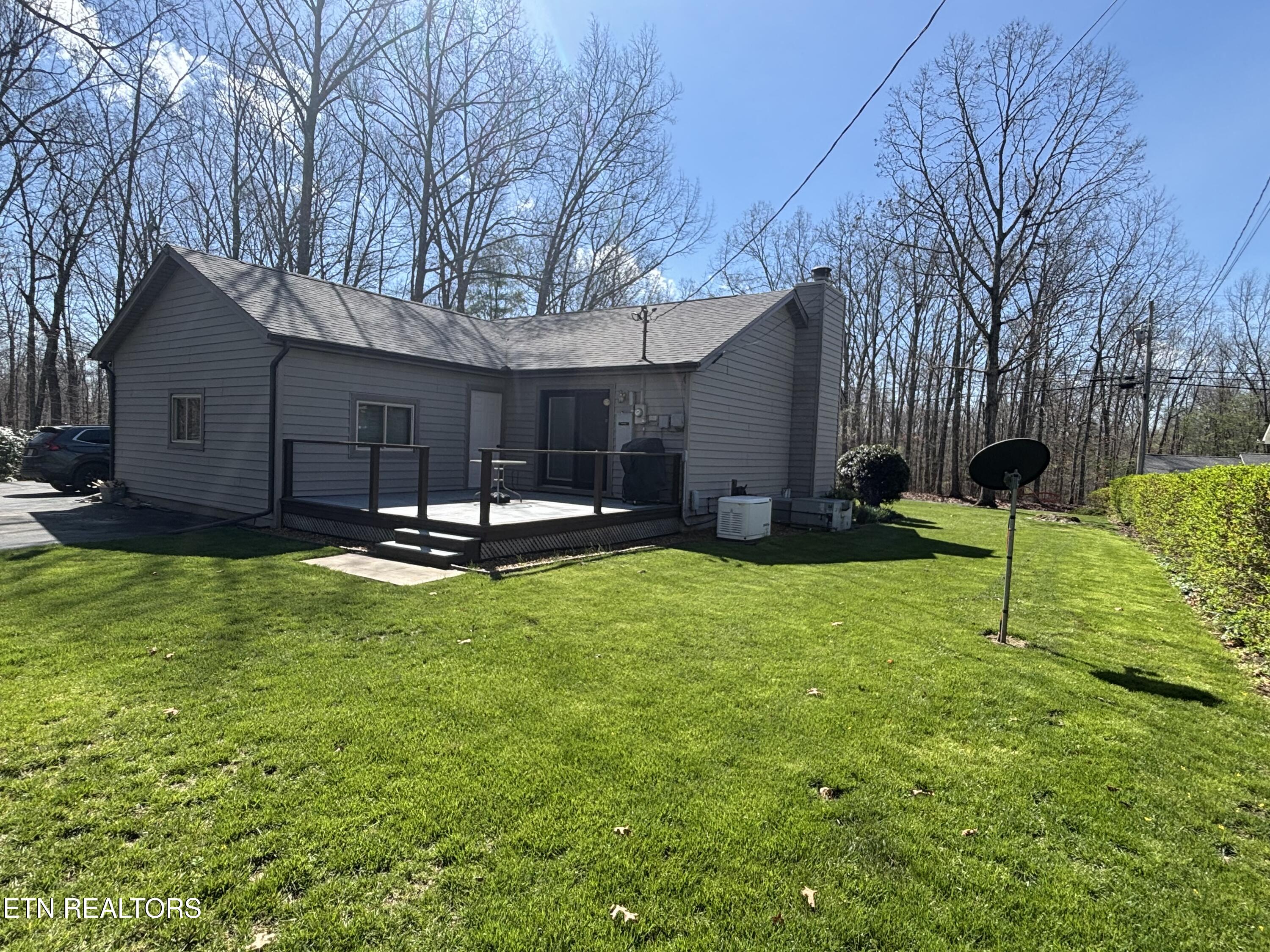6021 Osage Road Crossville, TN 38572 - Photo 27 of 33 Back yard and Trex Deck