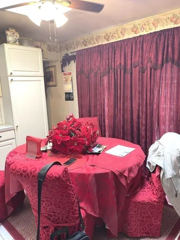 a bedroom with a bed and a table