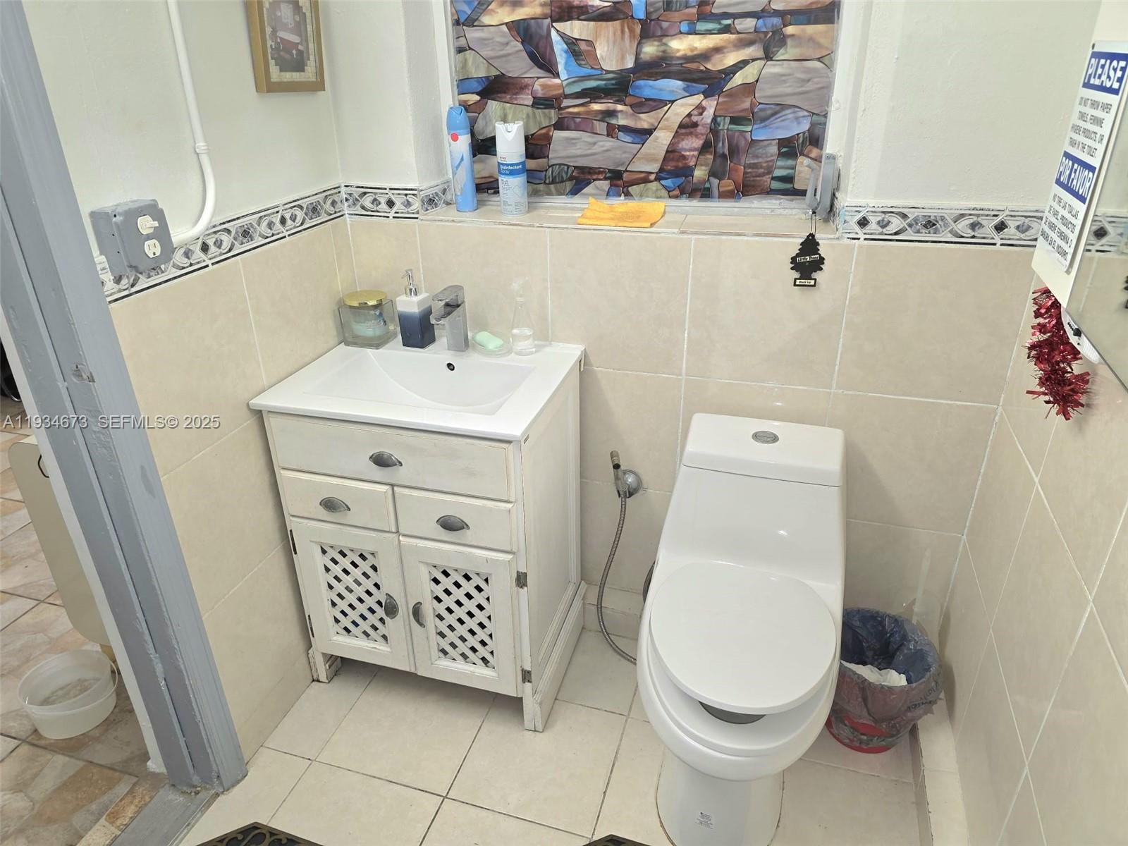 3601 Northwest 102nd Street Miami, FL 33147 - Photo 13 of 19 a bathroom with a sink toilet and shower