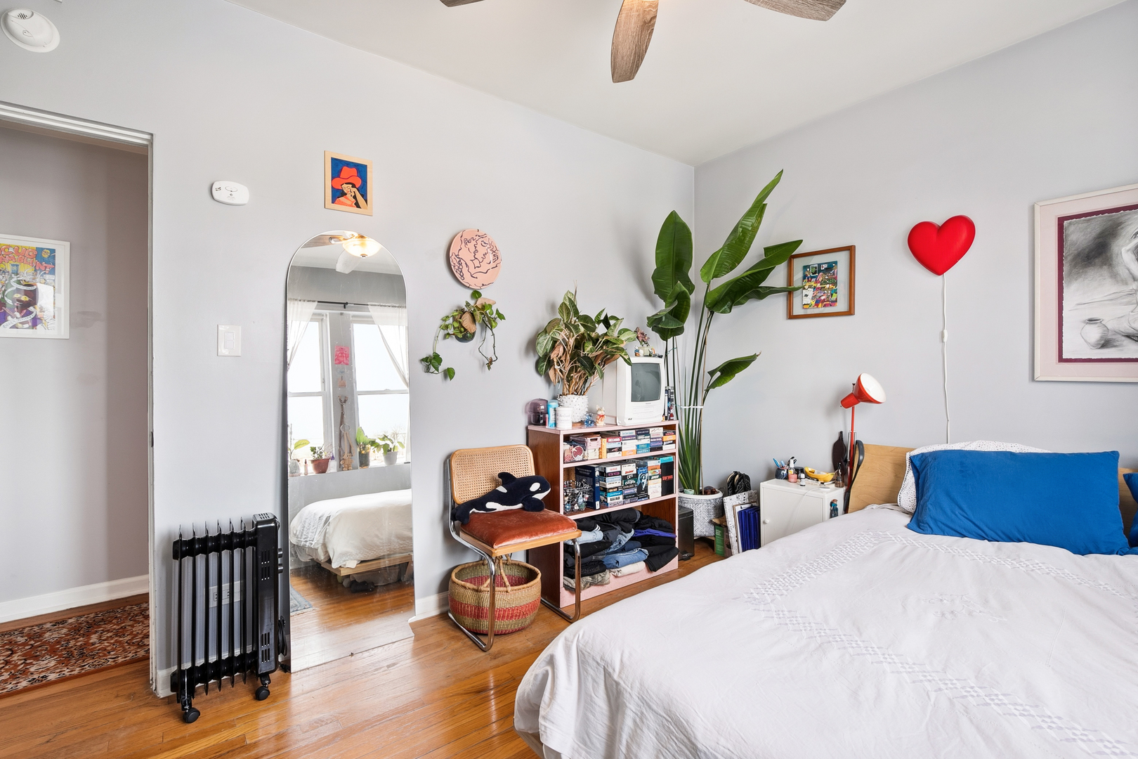 4006 West Nelson Street, Unit 6B Chicago, IL 60641 - Photo 11 of 13 a bedroom with furniture and a wooden floor