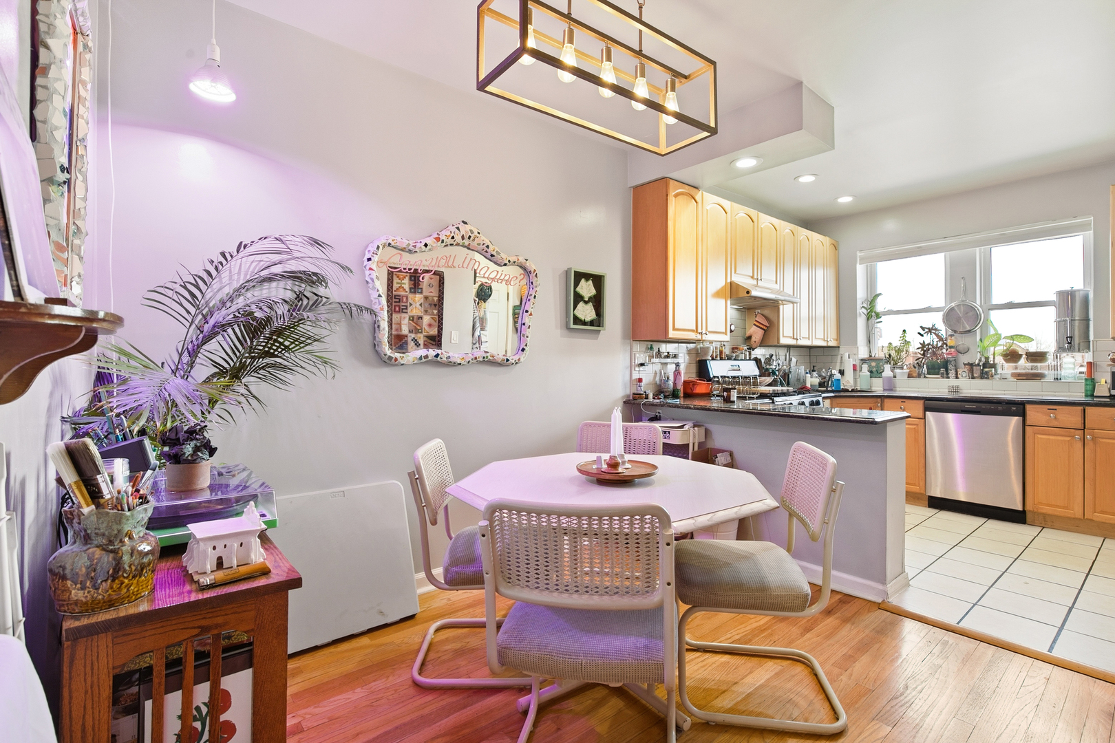 4006 West Nelson Street, Unit 6B Chicago, IL 60641 - Photo 2 of 13 a dining room with furniture and a floor to ceiling window