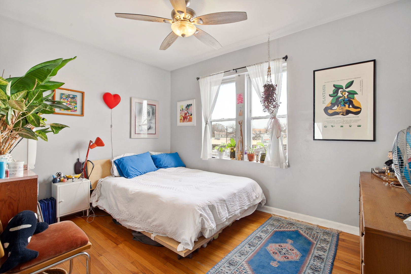 4006 West Nelson Street, Unit 6B Chicago, IL 60641 - Photo 9 of 13 a bedroom with a bed and a window