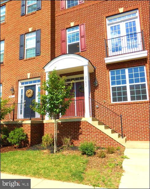 a front view of a house having yard