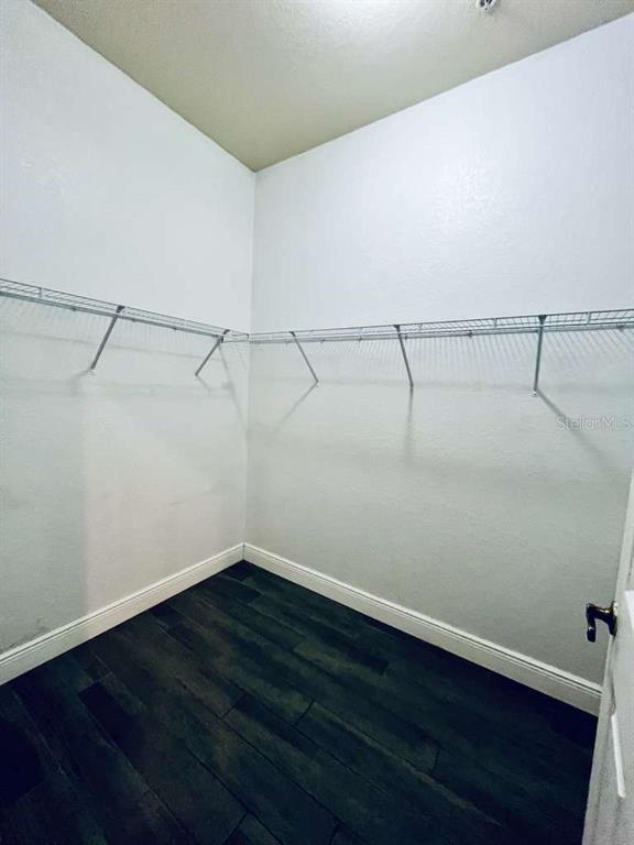 3311 Whitestone Circle, Unit 206 Kissimmee, FL 34741 - Photo 18 of 26 a view of a room with racks on the wall