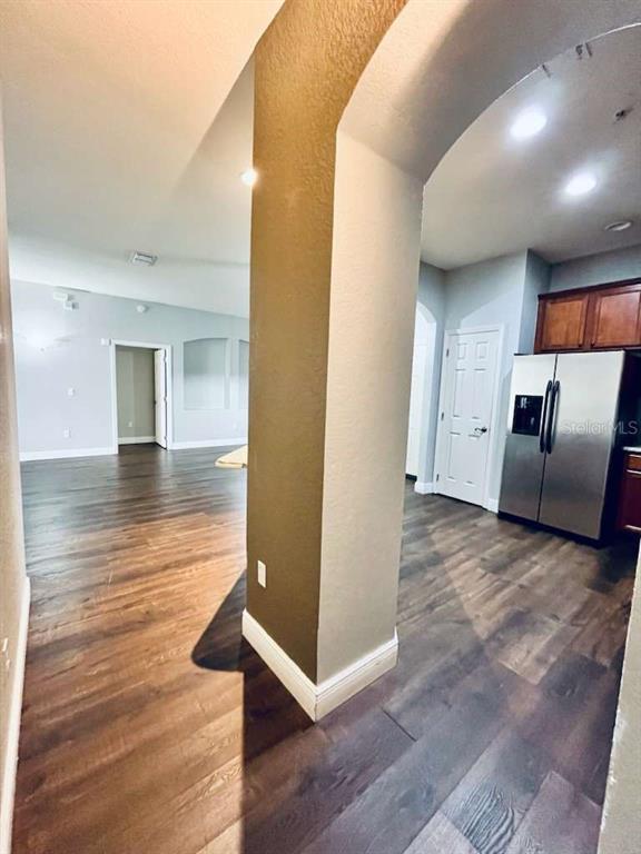 3311 Whitestone Circle, Unit 206 Kissimmee, FL 34741 - Photo 20 of 26 a view of a livingroom with wooden floor