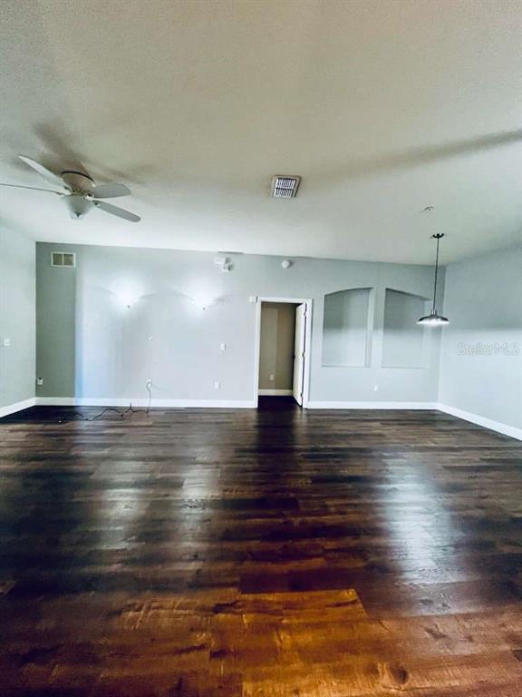 3311 Whitestone Circle, Unit 206 Kissimmee, FL 34741 - Photo 9 of 26 a view of empty room with wooden floor