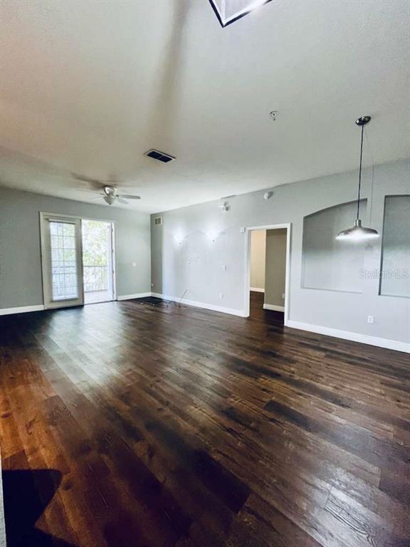 3311 Whitestone Circle, Unit 206 Kissimmee, FL 34741 - Photo 10 of 26 a view of a room with wooden floor