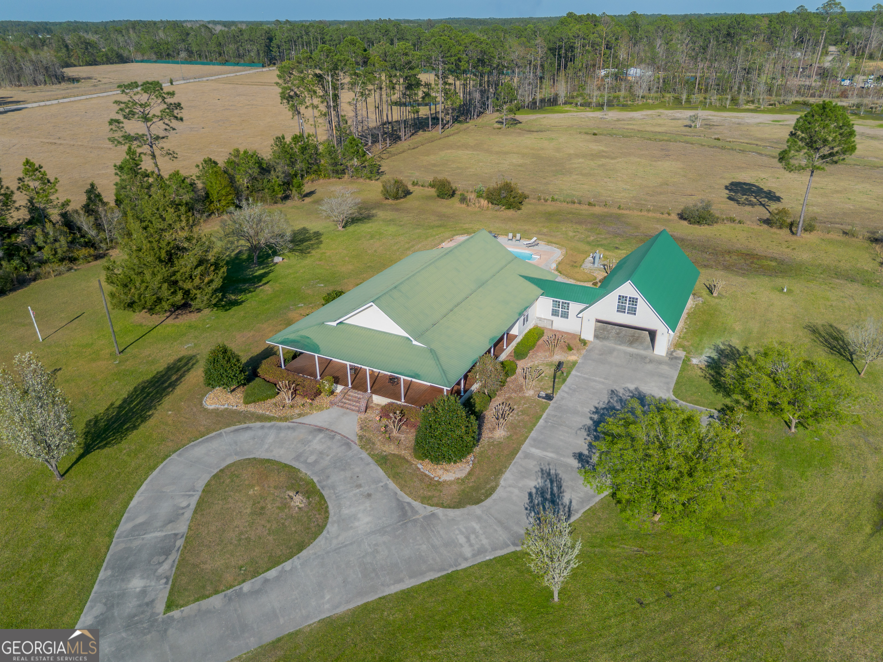 3300 Connor Lane Waycross, GA 31503 - Photo 8 of 42 an aerial view of residential houses with outdoor space and lake view