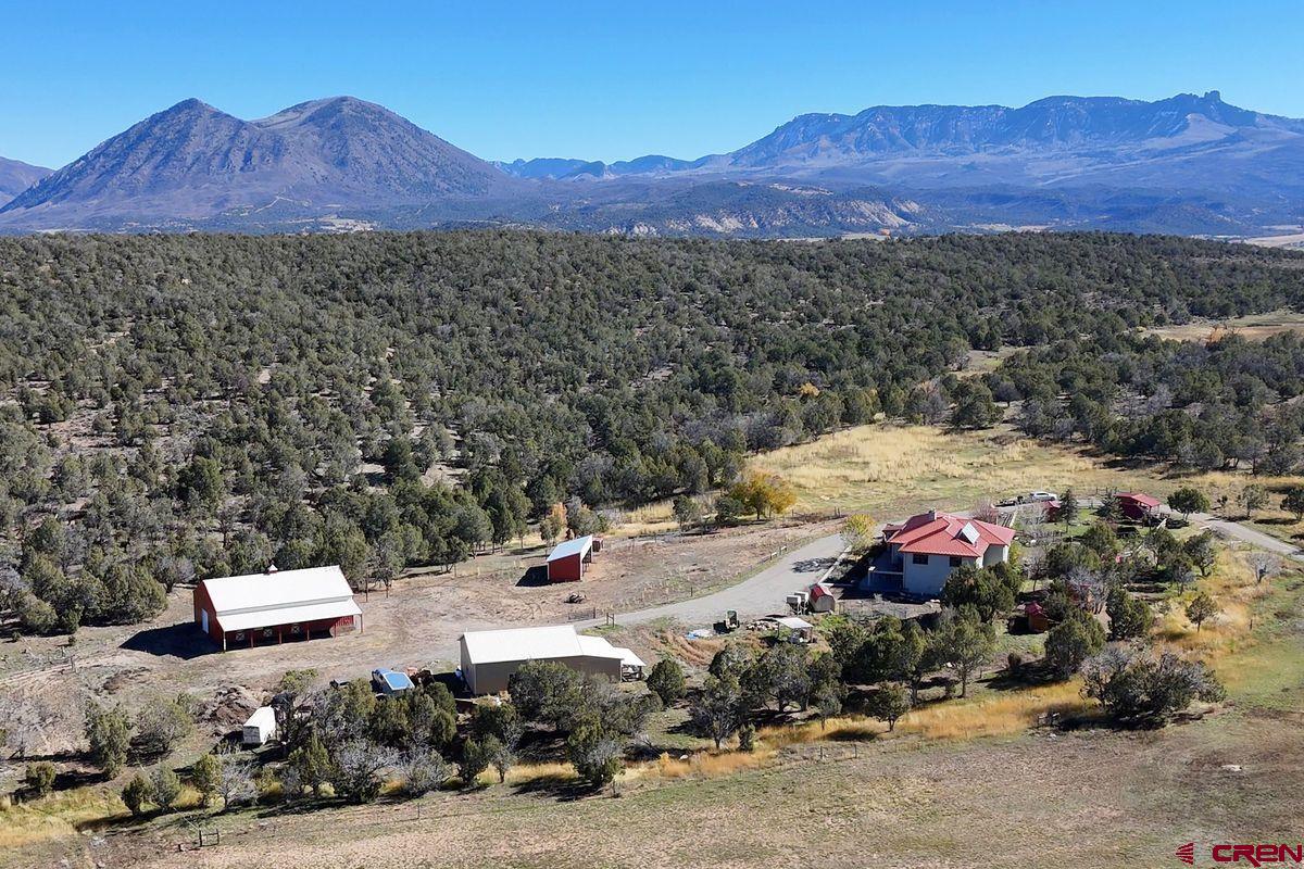 a view of a city with mountains in the background