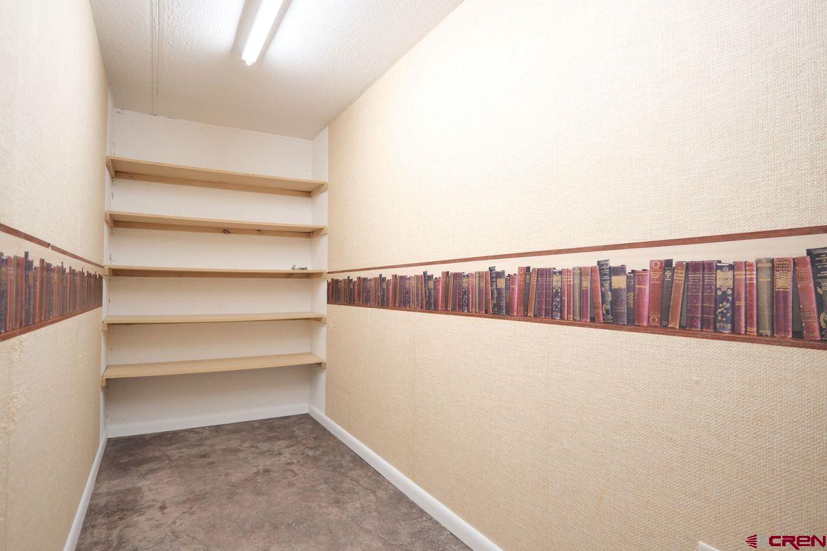 78300 Hunters Ridge Lane Crawford, CO 81415 - Photo 15 of 32 a view of an empty room with stairs