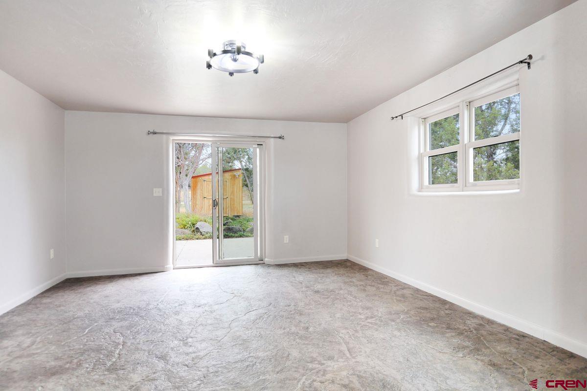 78300 Hunters Ridge Lane Crawford, CO 81415 - Photo 18 of 32 a view of an empty room with a window