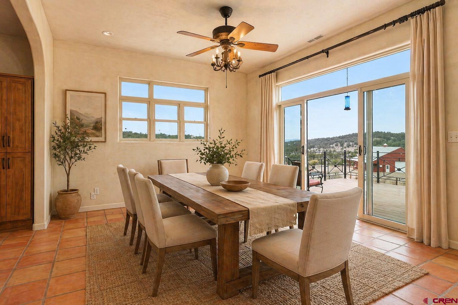 78300 Hunters Ridge Lane Crawford, CO 81415 - Photo 5 of 32 a view of a dining room with furniture window and outside view