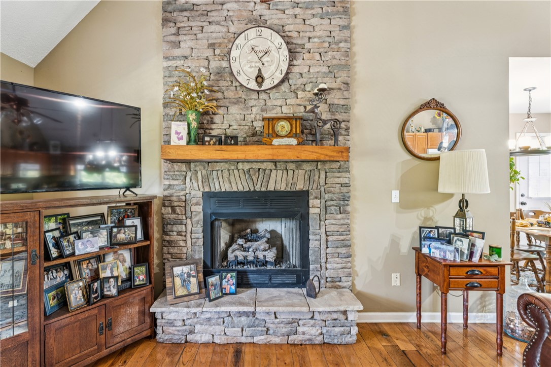 189 Little Choestoea Road Westminster, SC 29693 - Photo 4 of 38 This inviting living space features a captivating stone fireplace, perfect for cozy gatherings.