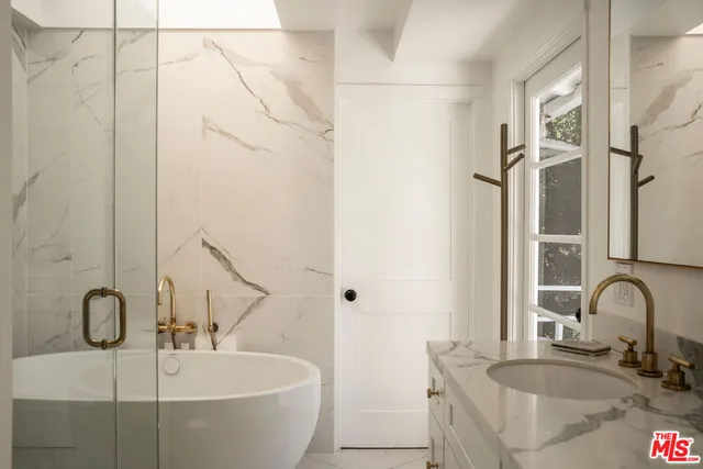a bathroom with a sink and a bathtub