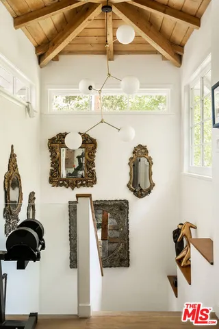 a picture of a bathroom with a sink and mirror