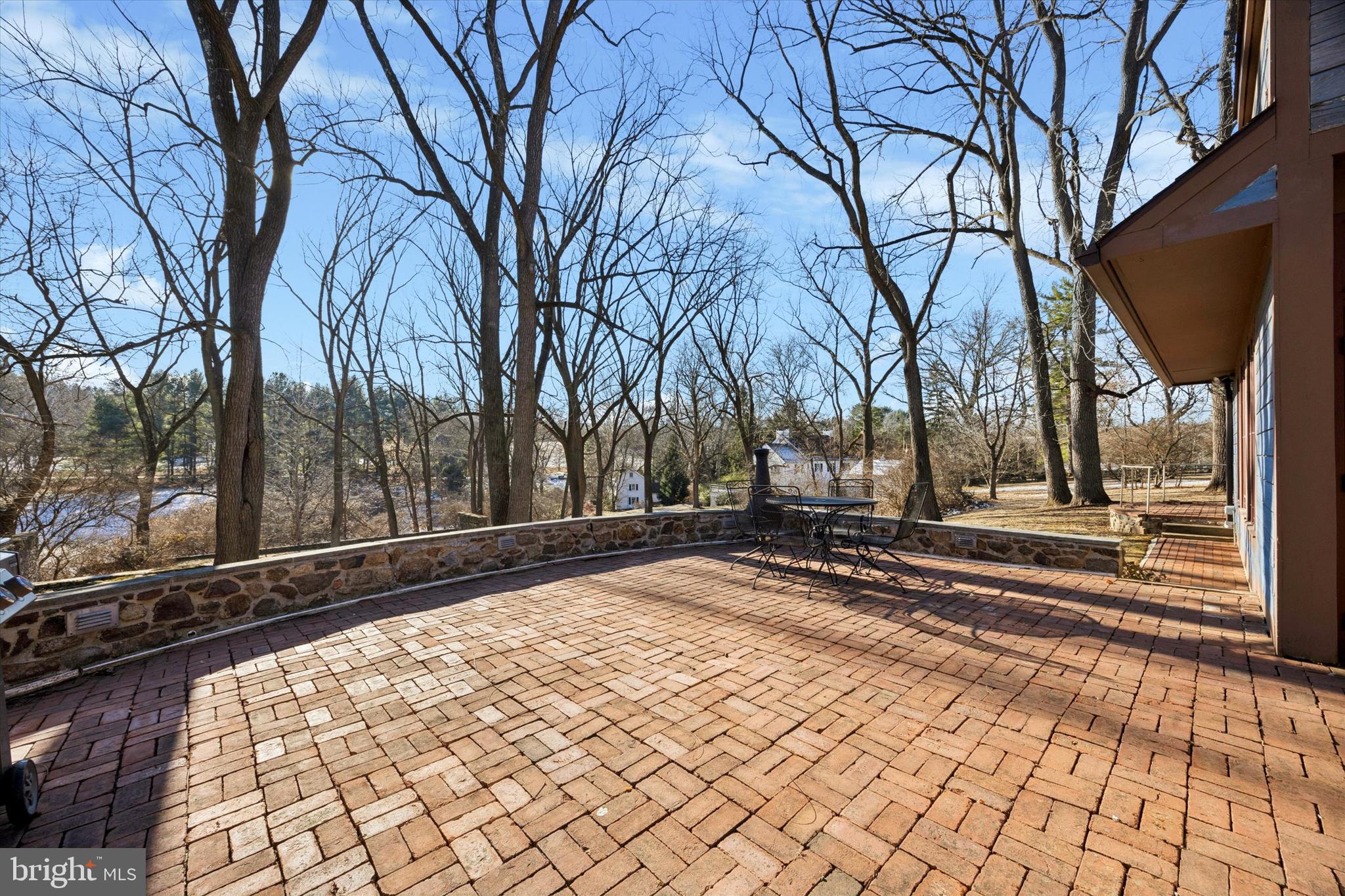 1991 Swedesford Road Malvern, PA 19355 - Photo 21 of 67 Brick Patio off Kitchen shaded by grove of Walnuts