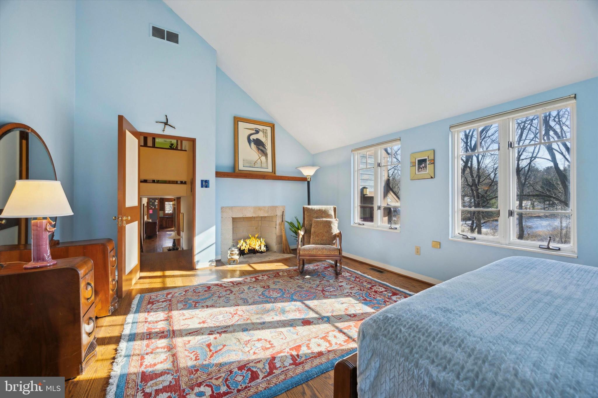 1991 Swedesford Road Malvern, PA 19355 - Photo 35 of 67 a living room with furniture a large window and a fireplace