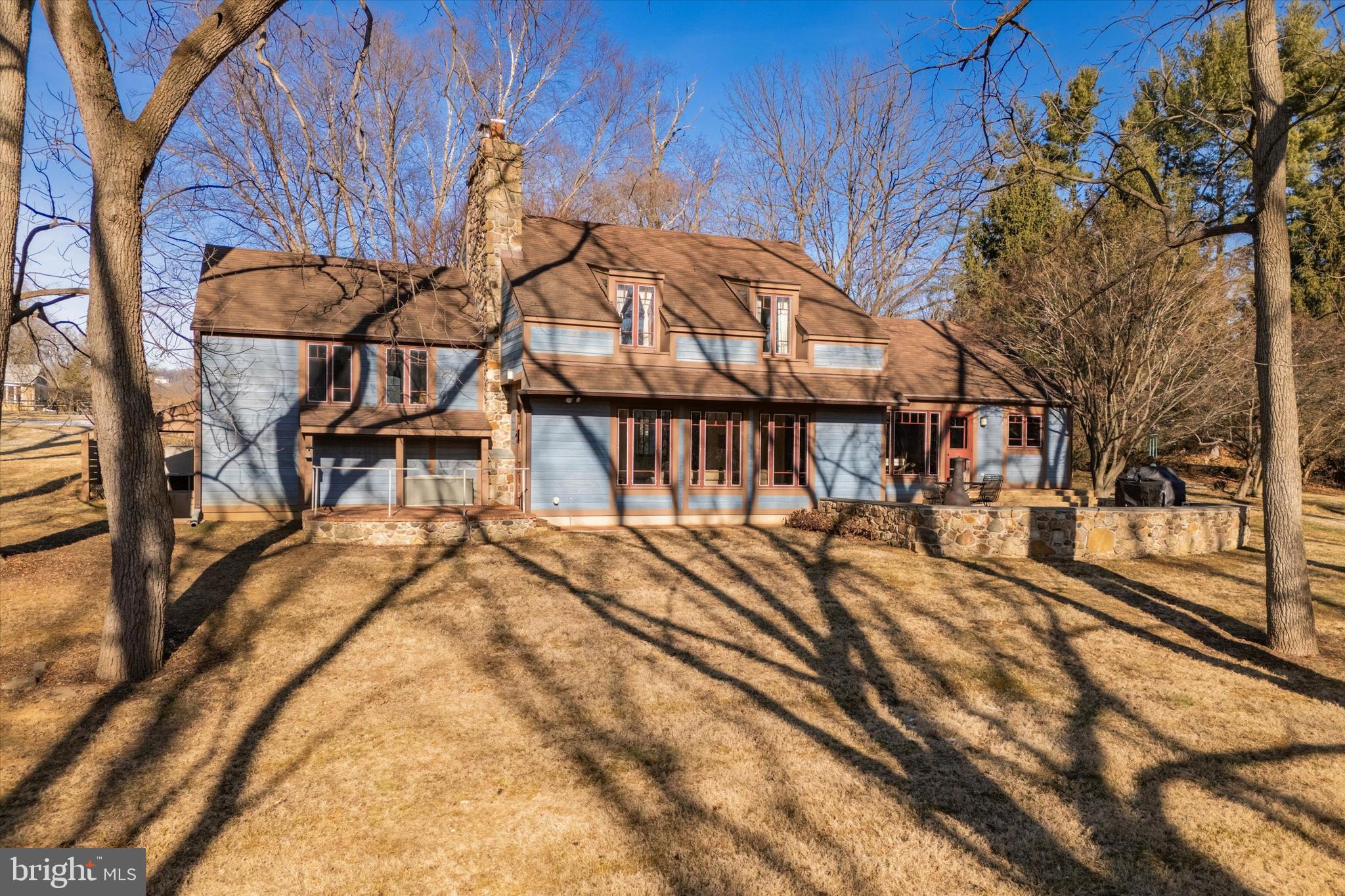 1991 Swedesford Road Malvern, PA 19355 - Photo 4 of 67 a view of a house with backyard and sitting area