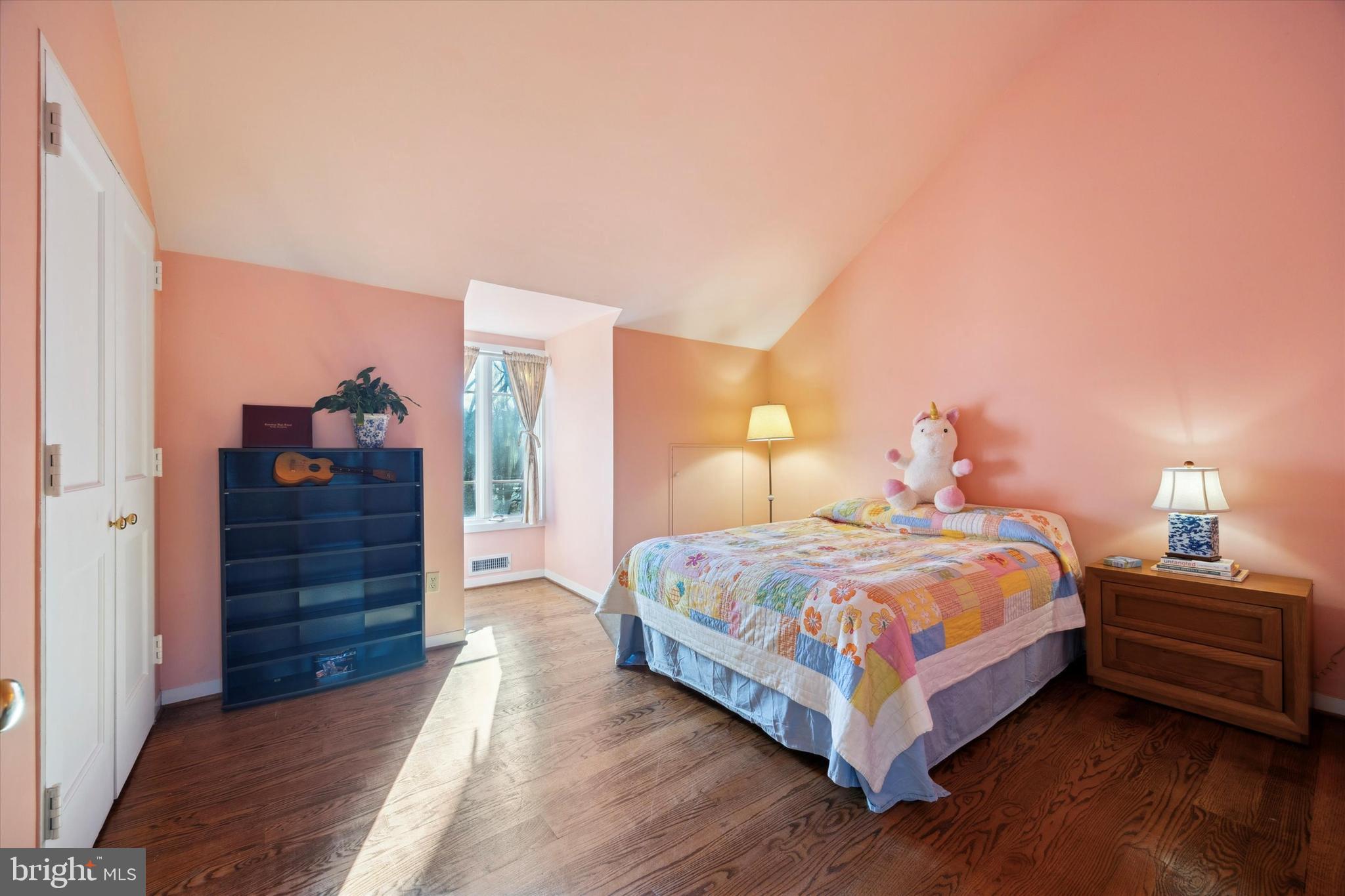 1991 Swedesford Road Malvern, PA 19355 - Photo 42 of 67 a bedroom with a bed and wooden floor