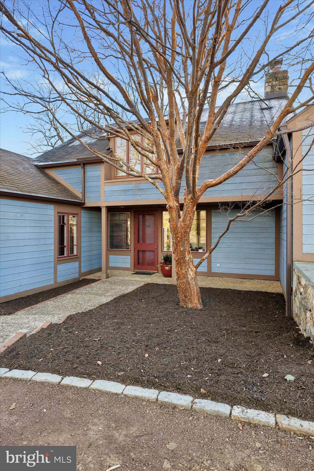 1991 Swedesford Road Malvern, PA 19355 - Photo 5 of 67 a front view of a house with a yard and garage