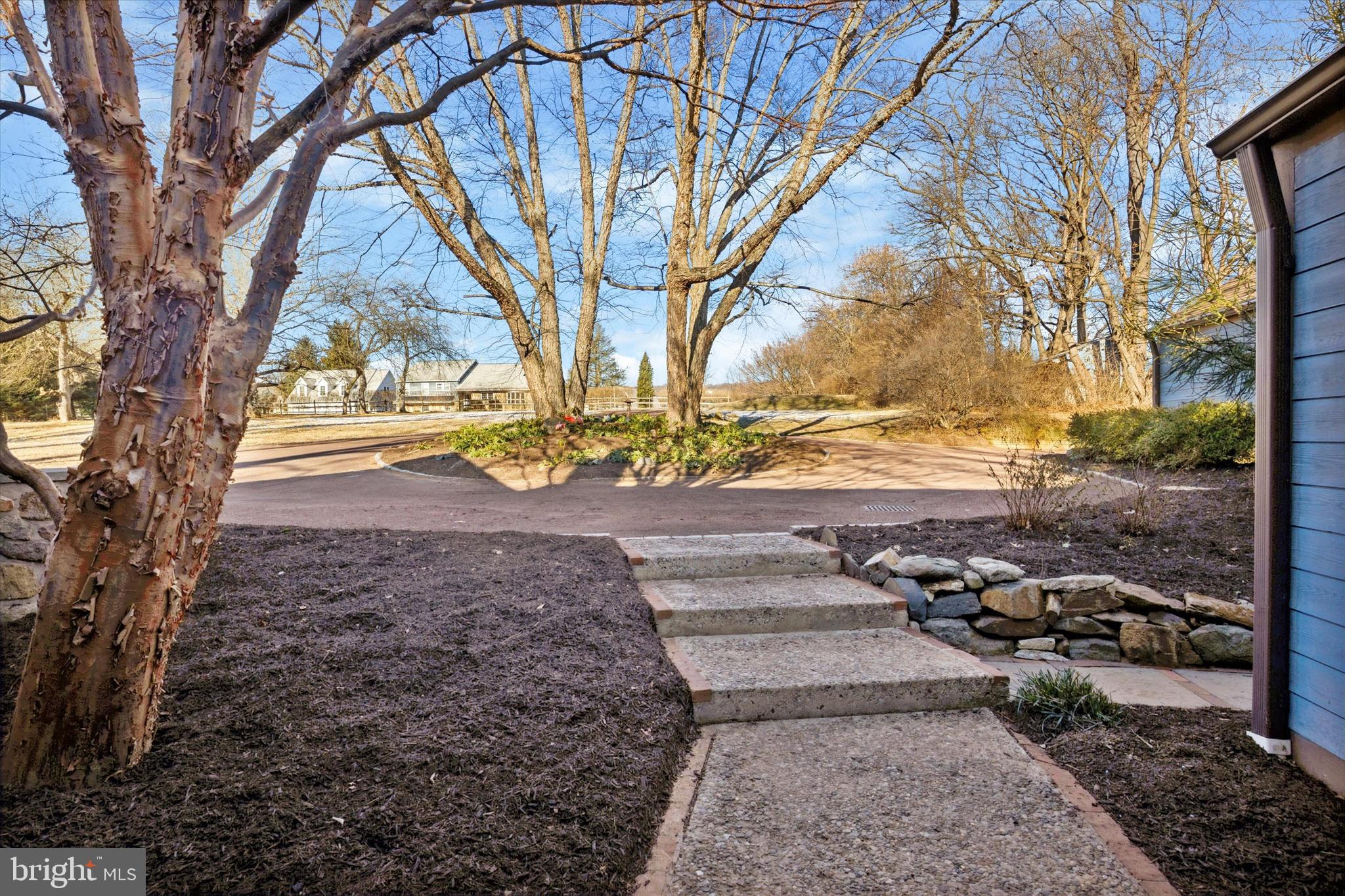 1991 Swedesford Road Malvern, PA 19355 - Photo 57 of 67 a backyard of a house with lots of green space
