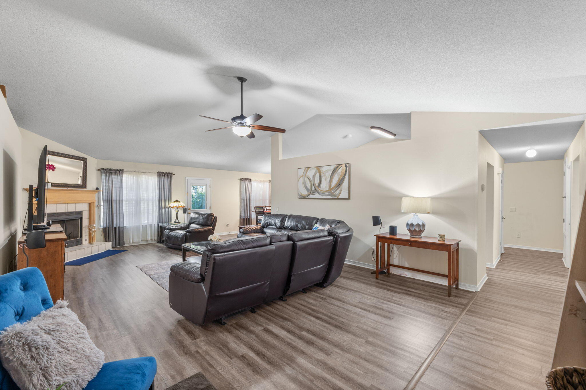7036 Rampart Way Pensacola, FL 32505 - Photo 11 of 39 a living room with furniture and a wooden floor