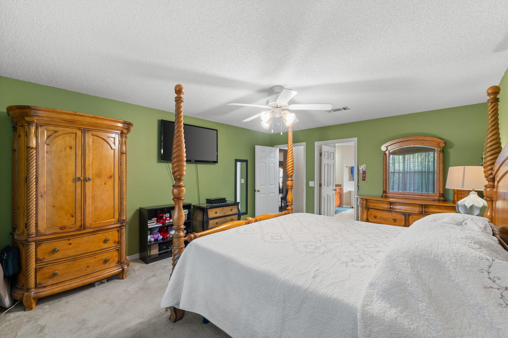 7036 Rampart Way Pensacola, FL 32505 - Photo 18 of 39 a bedroom with a bed dresser and a window