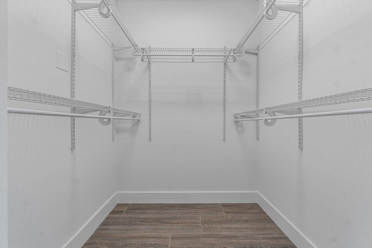 9427 Southeast Athena Street Hobe Sound, FL 33455 - Photo 20 of 33 Primary Closet