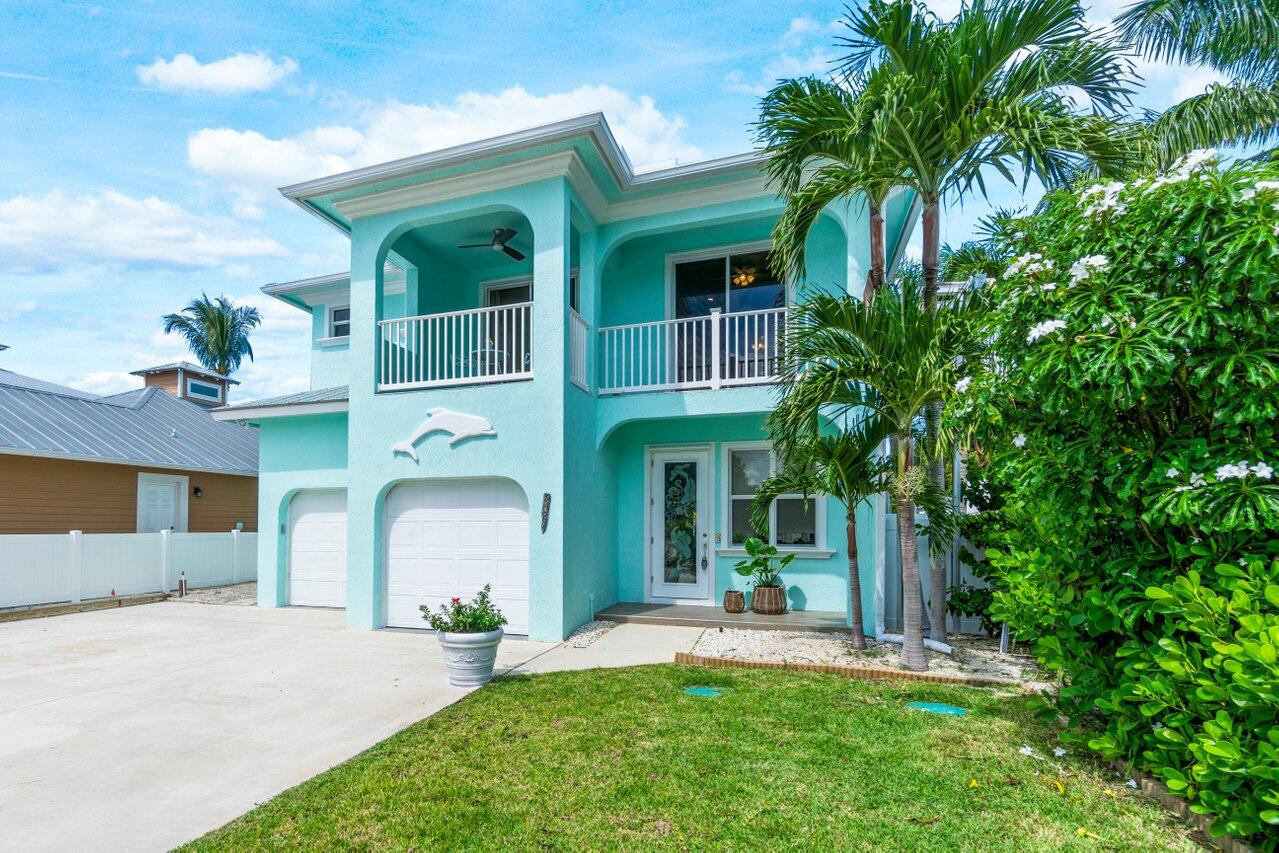 9427 Southeast Athena Street Hobe Sound, FL 33455 - Photo 2 of 33 Front