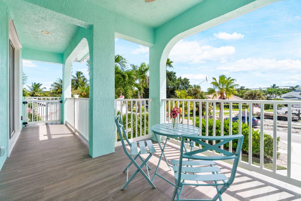 9427 Southeast Athena Street Hobe Sound, FL 33455 - Photo 22 of 33 Second Floor Street Balcony