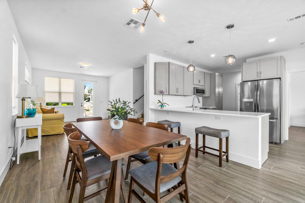 9427 Southeast Athena Street Hobe Sound, FL 33455 - Photo 3 of 33 Dining and Den Area