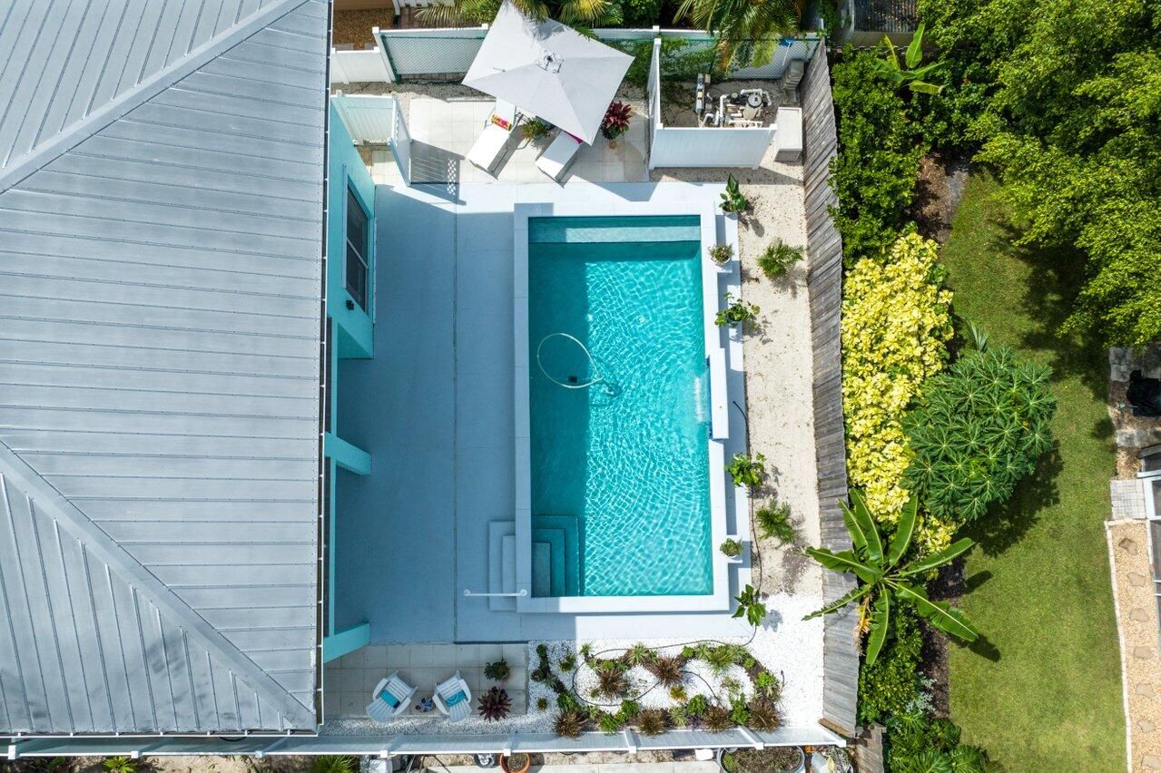 9427 Southeast Athena Street Hobe Sound, FL 33455 - Photo 32 of 33 Pool Aerial.