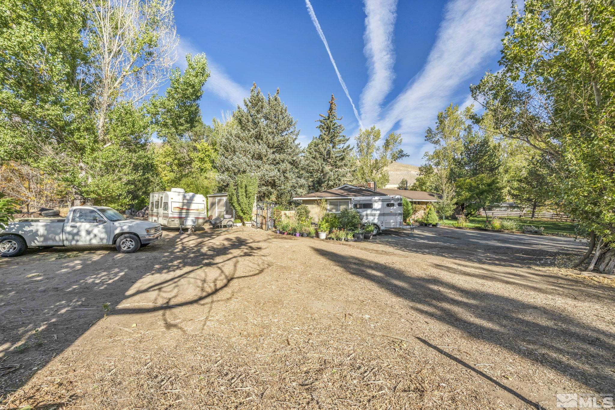 55 Surrey Drive Reno, NV 89521 - Photo 28 of 40 a view of a city street with cars